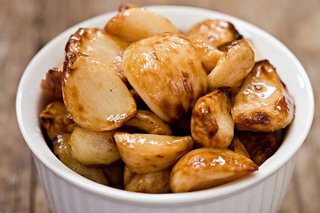 What is the benefit of eating roasted garlic?