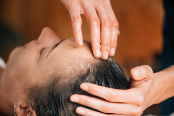 Hot oil massage for dandruff free and healthy hair